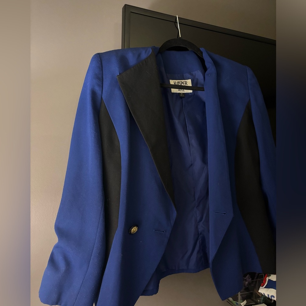 Blue and Black Blazer shoulder pads gives stylish look and cinched waist.